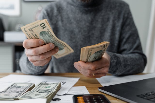 person counting money